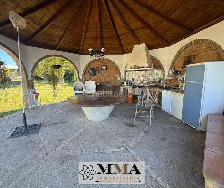Foto 4cf84daf-babe-4988-87d0-f39857ad85b1. Xalet amb xemeneia calefacció aparcament piscina a El Rompido