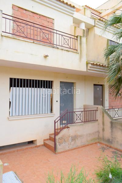 Foto eb3f8878-402e-4b1f-a8e5-65428ab33591. Casa adossada a calle tio diego meroño 41 a Las Lomas de Rame-Bahía Bella Alcázares (Los)