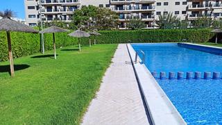 Appartement  Calle de lanzarote. Piso nuevo en playa del puig con piscina padel garaje y trastero