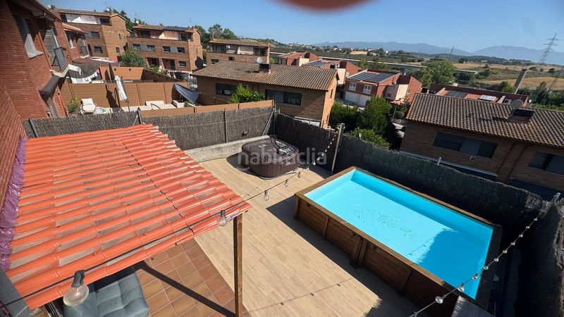Foto dd3b85e6-c73d-4442-8b73-7533a7249b5a. Casa adossada amb aparcament a Roca del Vallès (La)
