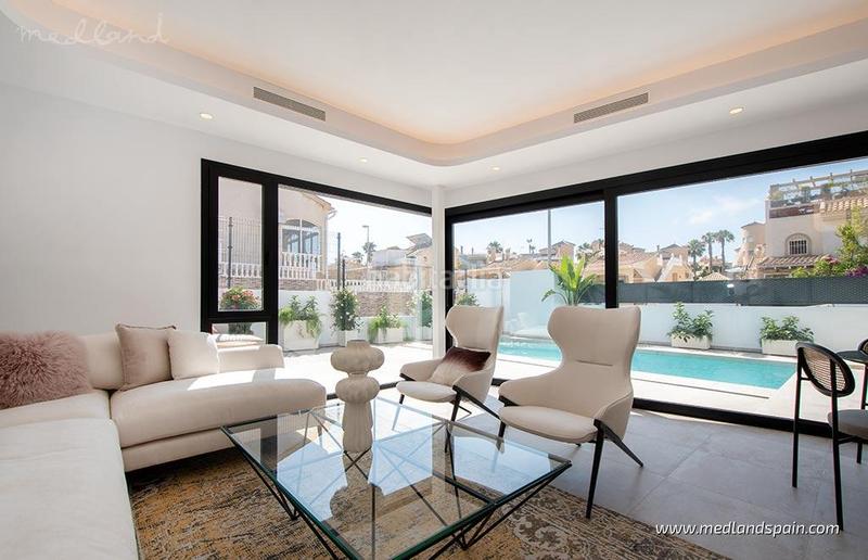 Foto 77edf513-f8ec-4b72-85a5-794b0db84ed2. Chalet avec parking piscine dans La Florida Orihuela