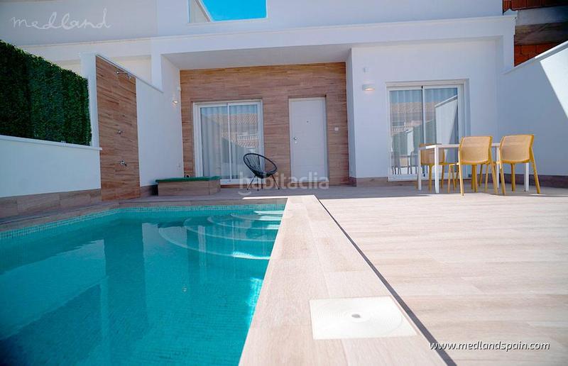 Foto d5533b64-0aa9-40ed-a29c-1cea18ae1575. Casa adossada amb aparcament piscina a San Javier San Javier