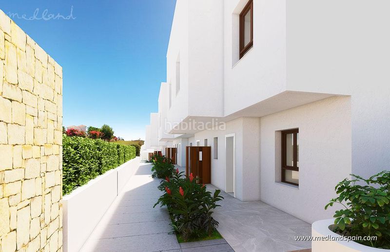 Foto b1728371-7ea8-419e-ad46-5870e7b43cc4. Casa adosada adosado de esquina de 3 dormitorios en primera línea de golf costa en Mijas