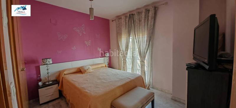 Foto f64d0a86-e342-40f0-bf07-2c0e29606f57. Reihenhaus mit parking in Olivar de Quintos Montequinto