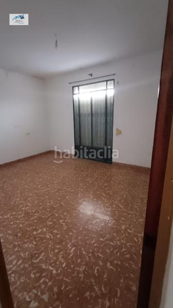 Foto 6ff7d21e-b244-4ba0-8434-31a7bf39bf5d. Casa adossada a Morón de la Frontera