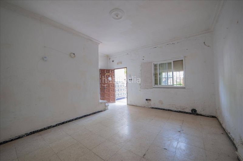 Foto c0327ca8-1cbb-46e3-b61d-ea713025ac5f. Casa adossada a Centro Bormujos
