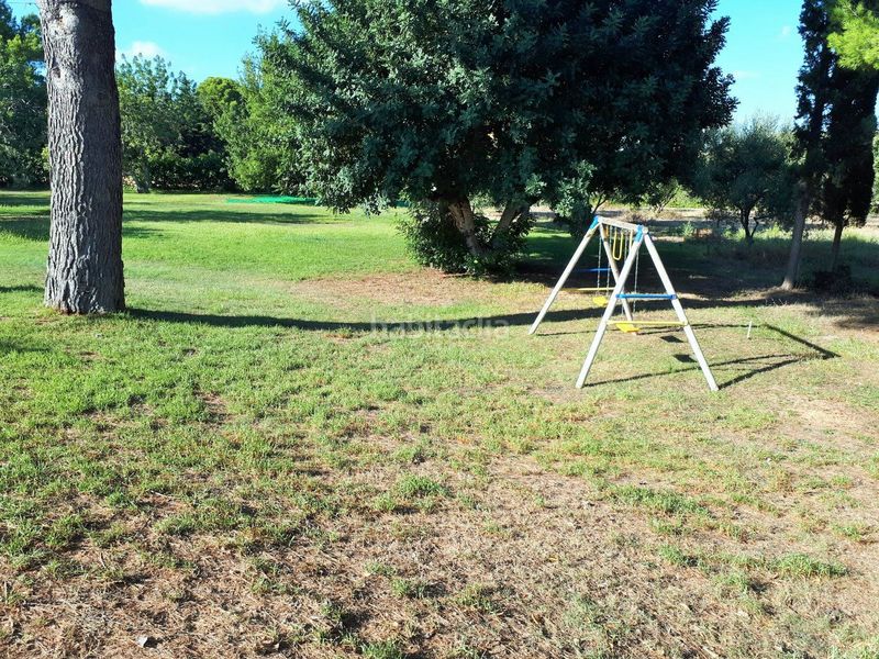 Foto e5b3cf66-a8c3-4fe2-b2eb-ebd71e34b22e. Xalet amb xemeneia calefacció aparcament piscina a Torredembarra