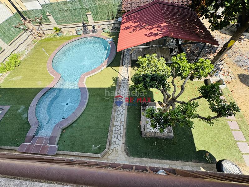 Foto 74f8a563-099d-4e64-92a1-c6d35941b2e1. Casa pareada  en venta girona amplia, con jardín, piscina y garaje privado en Amer