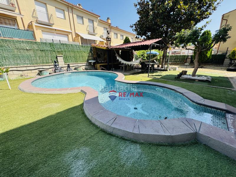 Foto dd21ad1a-df15-46c1-8619-0024102f5cb6. Casa pareada  en venta girona amplia, con jardín, piscina y garaje privado en Amer