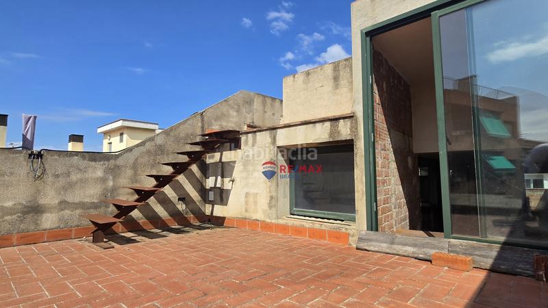 Foto 0da5d526-0efa-49d2-9782-a0b5f750cb4f. Casa adosada en Blanes - cl raval 114 edificio único con construcción moderna y vistas al mar desde la azotea en el centro en Blanes