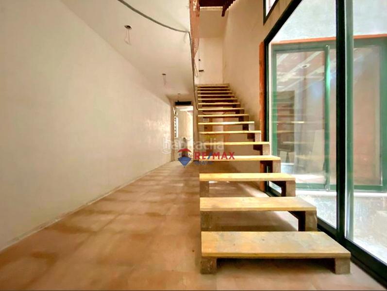 Foto 4b48e728-4698-41f2-82ff-26034b2141f8. Casa adosada en Blanes - cl raval 114 edificio único con construcción moderna y vistas al mar desde la azotea en el centro en Blanes