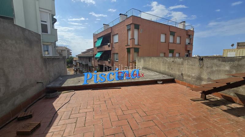 Foto 4e4d471b-1e55-4e7b-bf53-f1a41d914fca. Casa adosada en Blanes - cl raval 114 edificio único con construcción moderna y vistas al mar desde la azotea en el centro en Blanes