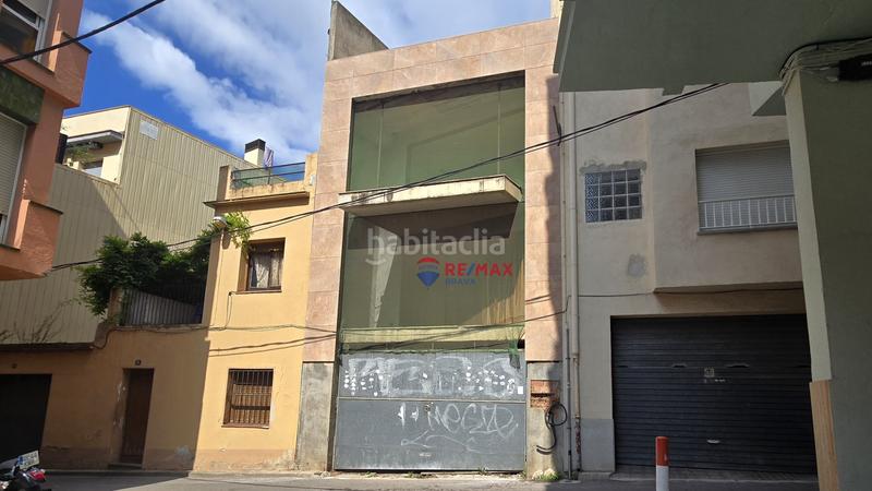 Foto 8463898e-a154-44f4-a7dc-c1ad8da4123f. Casa adosada en Blanes - cl raval 114 edificio único con construcción moderna y vistas al mar desde la azotea en el centro en Blanes