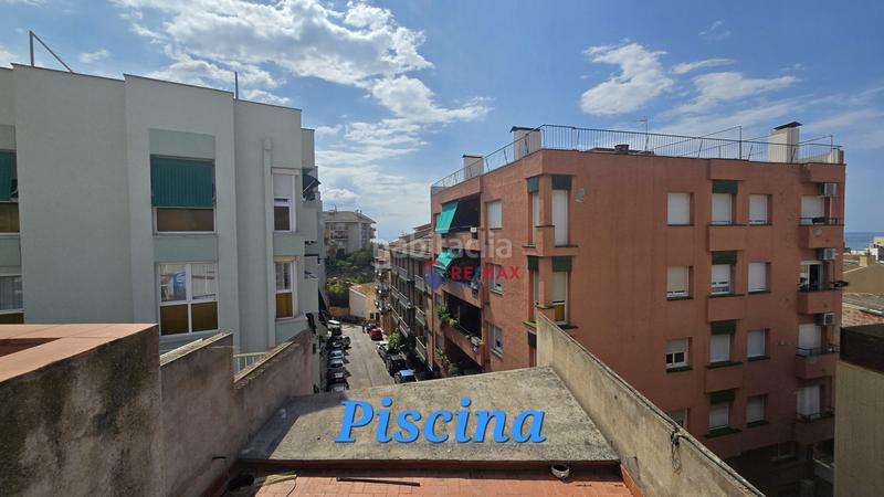 Foto c76045bc-fba9-4301-a19b-fad88967b328. Casa adosada en Blanes - cl raval 114 edificio único con construcción moderna y vistas al mar desde la azotea en el centro en Blanes