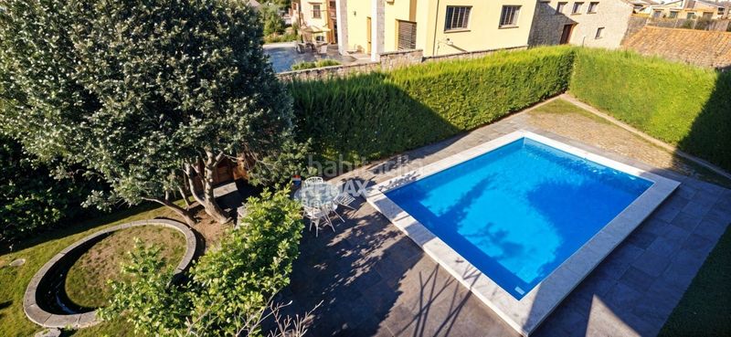 Foto 18e4001d-fde0-476d-ad7a-52c654a0618f. Casa adossada amb aparcament piscina a Celrà