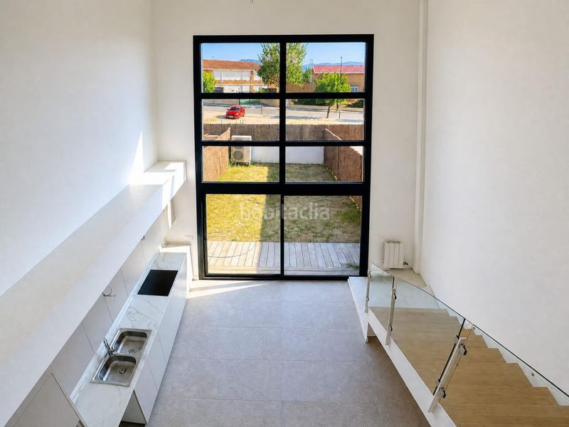 Foto ff725690-fb15-47b2-b355-021699a3df0a. Casa adossada amb aparcament a Hostalric