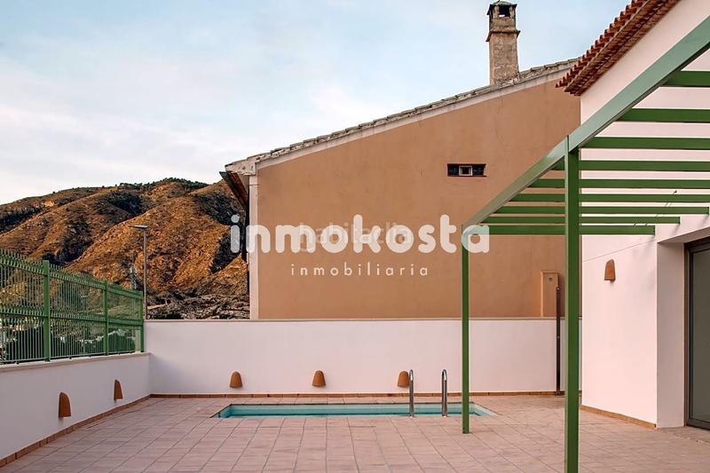 Foto 6783bcc1-579c-4767-a7af-5d6f34111601. Casa esta casa recientemente construida, en el corazón , sorprende por su exquisito diseño y sus techos altos, que aportan una en Orxeta