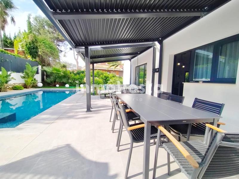 Foto 4a4919d4-5871-4681-97e7-6e6b618e032e. Maison avec parking piscine dans Sierra Helada Benidorm