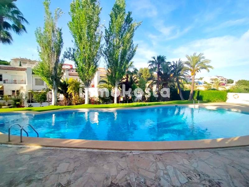 Foto a5fa1345-8044-4aee-87be-52a5898821d7. Casa aparellada amb piscina a San Rafael - Nucia Park Nucia (la)