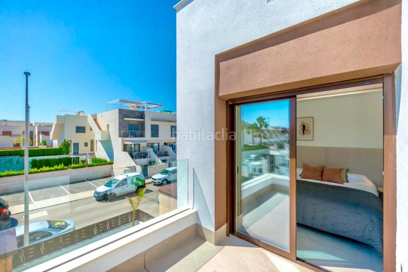 Foto c17ac328-b4bc-4bc4-847b-29947ac5eec5. Casa adossada amb aparcament piscina a Benijófar