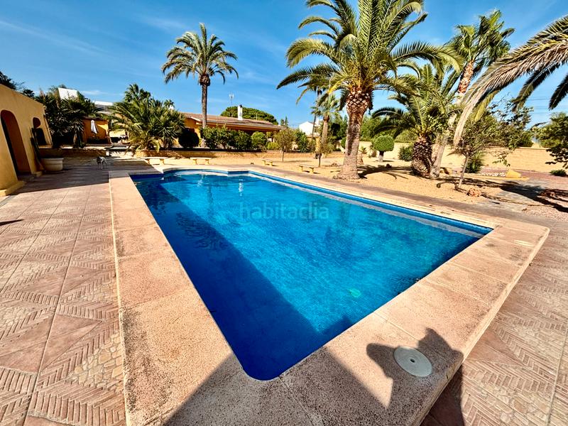 Foto c3a92ee3-958a-4318-8dd5-ab3532f47aac. Chalet avec cheminée chauffage parking piscine dans Alicante