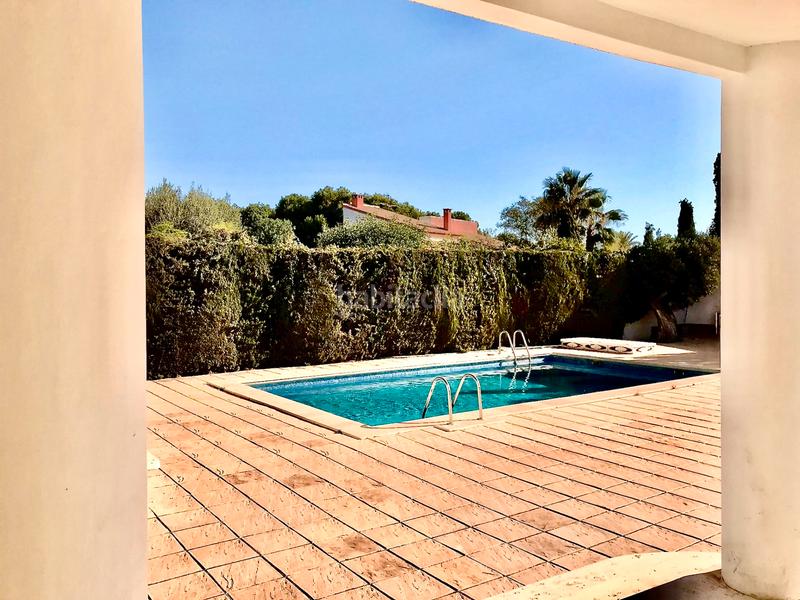 Foto 72061da6-c544-4b28-887e-02f5370587f1. Chalet con camino riscaldamento parcheggio piscina in Alicante