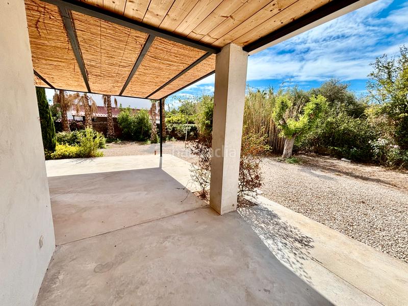 Foto a3fb9285-bcf0-48e5-ac8f-70e2095c8e66. Chalet with fireplace parking pool in La Font-Mezquitas San Juan de Alicante