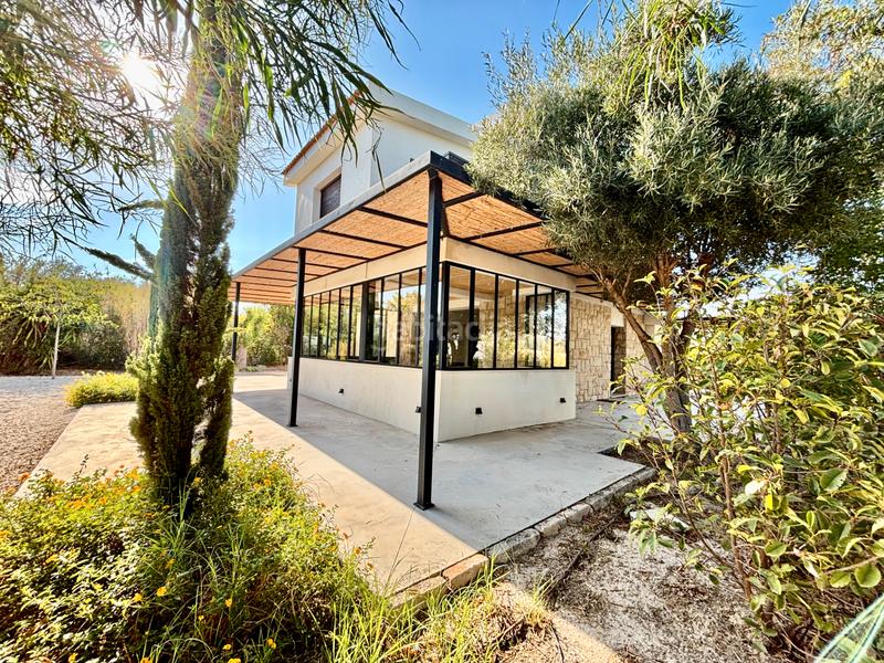 Foto af2b684c-a3fd-4a5b-8ba7-d2cffb5e20f6. Chalet with fireplace parking pool in La Font-Mezquitas San Juan de Alicante