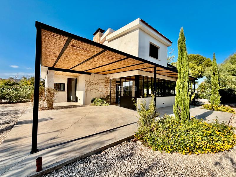 Foto 736596e5-c5a2-4141-ae39-58828a048fcb. Chalet con camino parcheggio piscina in La Font-Mezquitas San Juan de Alicante