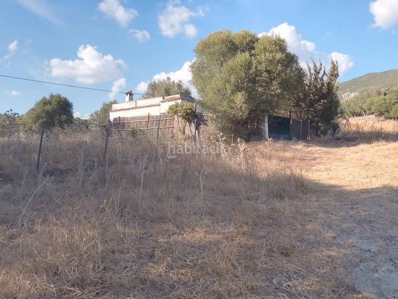 Foto a1c6a06c-73ee-4559-bf8b-9e4ee9d53fea. Finca rústica parcela rustica con casa en Ubrique