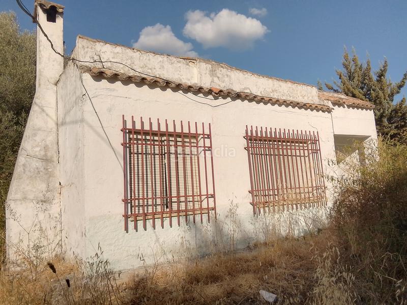 Foto d97cd32a-b53d-47f6-8ef4-f2b473bc4d6c. Finca rústica parcela rustica con casa en Ubrique