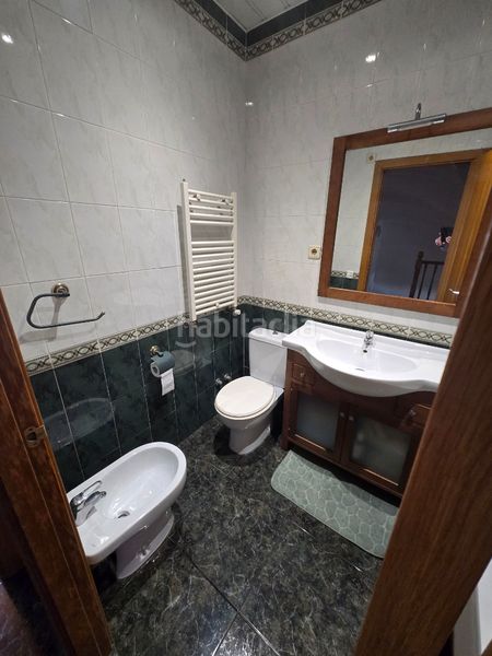 Foto a7c56cbf-b1a1-4265-bc94-1ea9728dee50. Casa aparellada amb calefacció aparcament a Roc Blanc Terrassa
