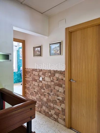 Foto 577fdb96-e535-41a0-8b9b-c65795a212ed. Casa aparellada a Ripoll