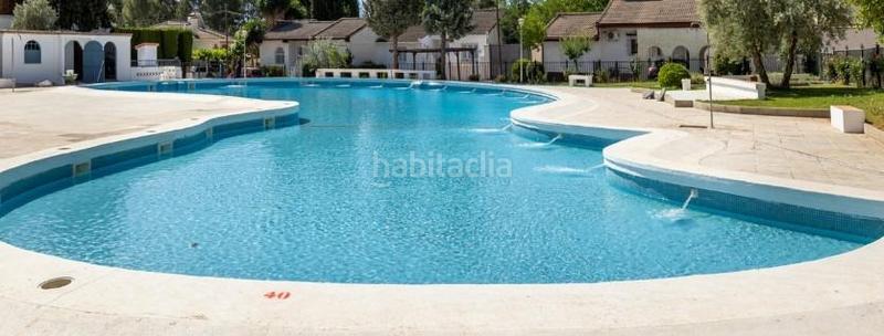 Foto 96ba6958-9f21-4308-a202-7dff7df9e56c. Chalet magnifico chalet con potencial extra vive y amplía en tu propio jardín! en Albolote