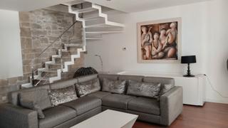 Dúplex  Plana de l'om. Duplex en el centro de la ciudad