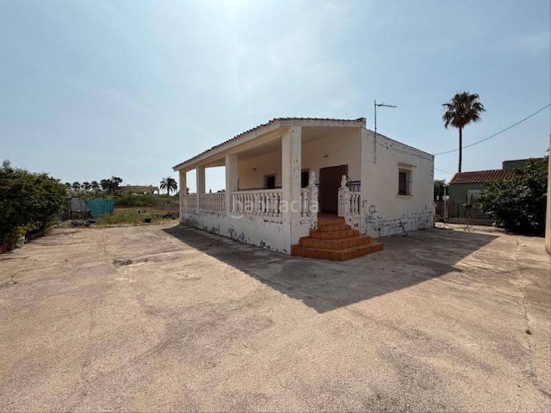 Foto c39686c9-5dc7-4496-b9b7-d22f62eb7611. Masia amb xemeneia piscina a El Marenyet Cullera