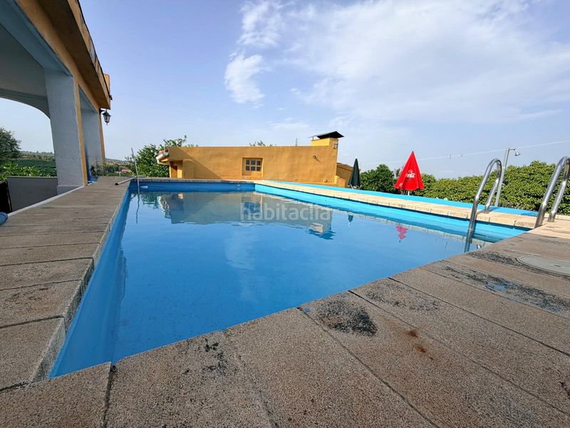 Foto 6798b617-f123-441b-b1bc-fe8540a5b92a. Xalet amb xemeneia piscina a Cheste