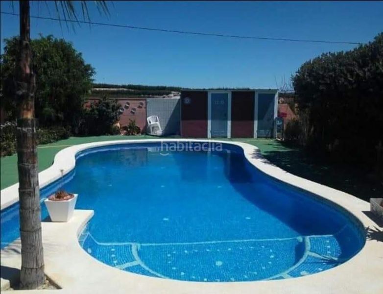 Foto 6befeee8-2a63-4d25-ada4-0e861a1bbd57. Casa amb calefacció aparcament piscina a Lorquí