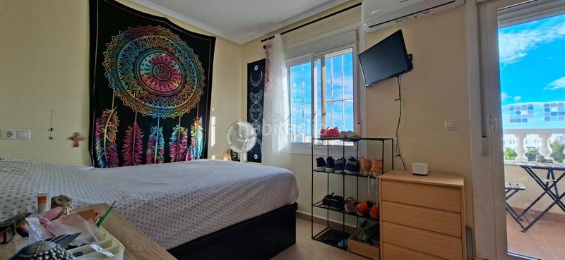 Foto 608cc3f0-9f12-445d-b64b-ff412df5f642. House in calle canarias 10 bl in Monte y Mar Santa Pola