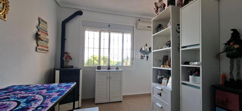 Foto eb25625c-8a35-443f-b3df-77f2ca2b68eb. House in calle canarias 10 bl in Monte y Mar Santa Pola