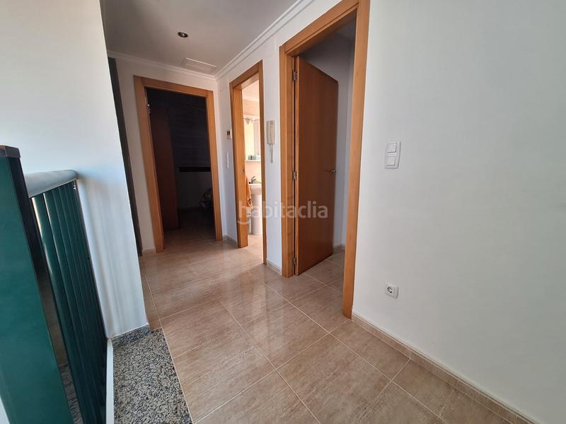 Foto 562b5a5f-6b68-42a6-a04e-2f8b697c1d0e. Casa aparellada amb aparcament a Les Palmeres Sueca