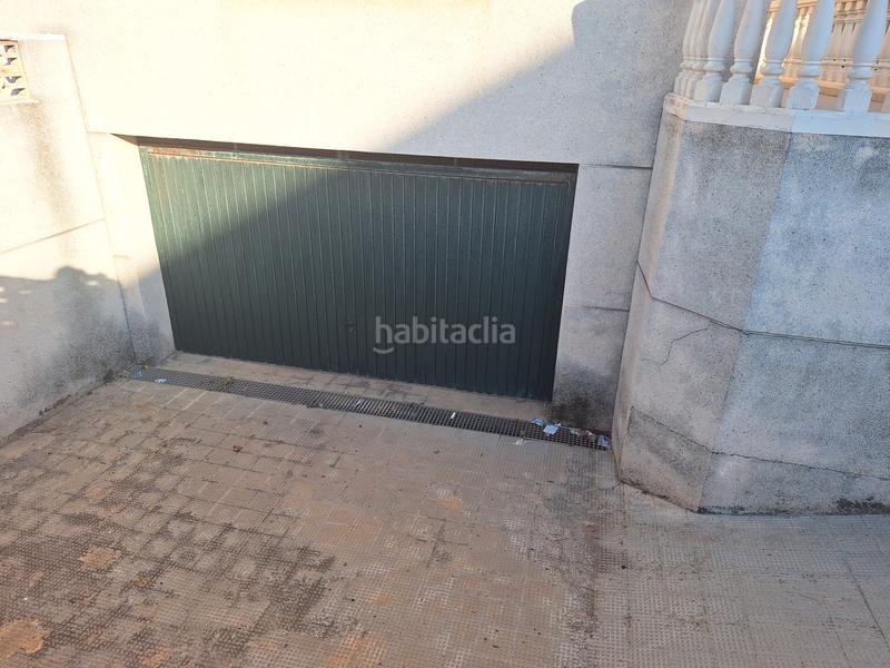 Foto a864f16d-0325-4852-a5c8-8e64f1e401fb. Casa aparellada amb aparcament a Les Palmeres Sueca