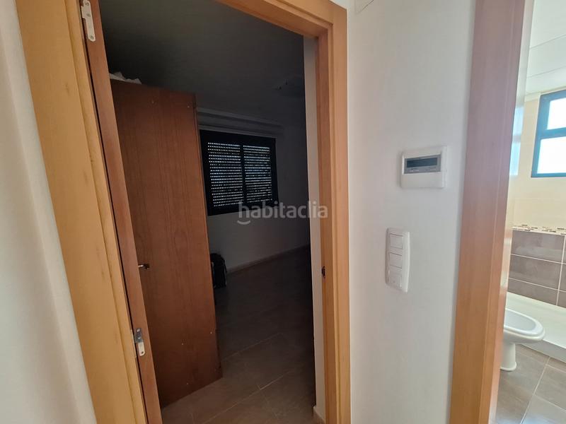 Foto afe4be19-6526-44a2-a027-19ca1ed69e65. Casa aparellada amb aparcament a Les Palmeres Sueca