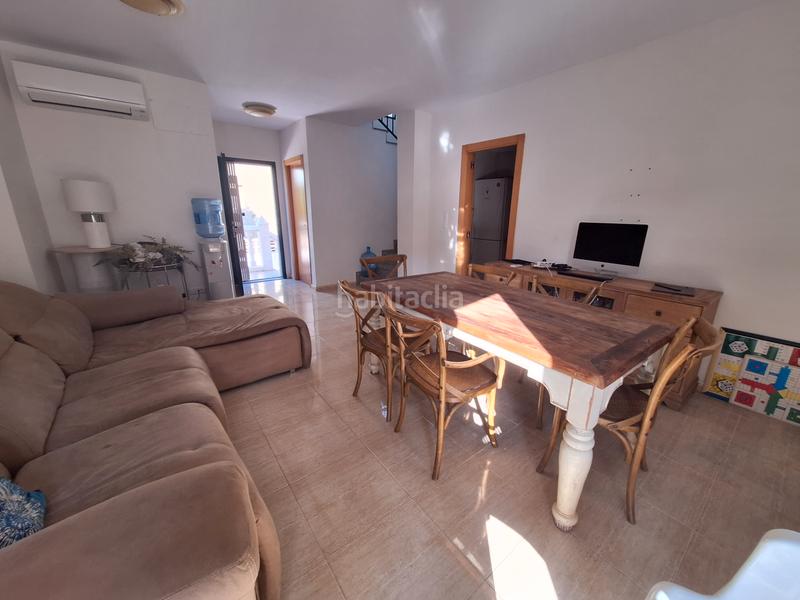 Foto c1b42647-4aee-49ac-9606-bb9ff57cbba7. Casa aparellada amb aparcament a Les Palmeres Sueca