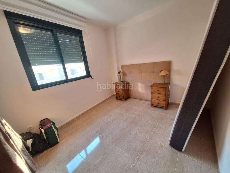Foto e2f0cdcc-724c-4368-8761-91f7b7ffb8e6. Casa aparellada amb aparcament a Les Palmeres Sueca