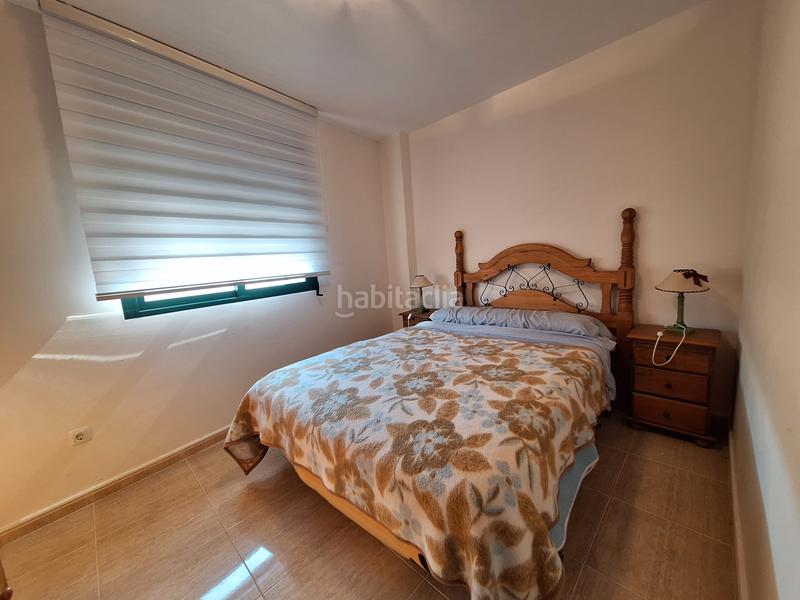Foto f1ace7be-c05a-4a84-8da7-a7449cdf1e16. Casa aparellada amb aparcament a Les Palmeres Sueca