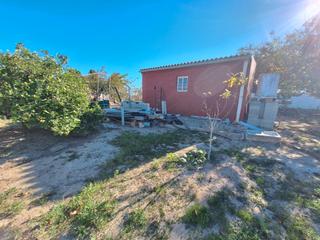 Finca rústica a Sueca. Campo con almacen agricola