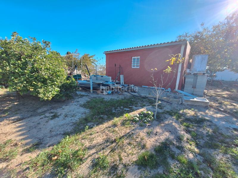 Foto b6cb73bc-826b-4760-b1ce-fb7fa2a31a6d. Finca rústica a Sueca Sueca