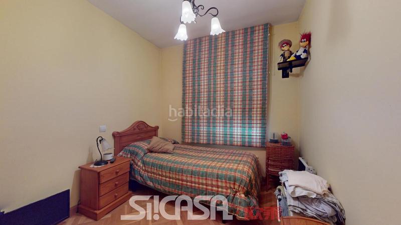 Foto 02184801-bd65-46f6-9389-85fcb2f7b4fc. Casa adosada en Fuentebella-San Fermín-El Leguario Parla