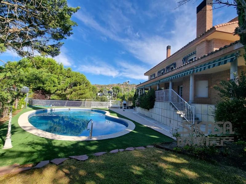 Foto 8572e68c-4e5f-4aa1-b94c-45a2dc50a2af. Casa con riscaldamento parcheggio piscina in Los Robles Torrelodones